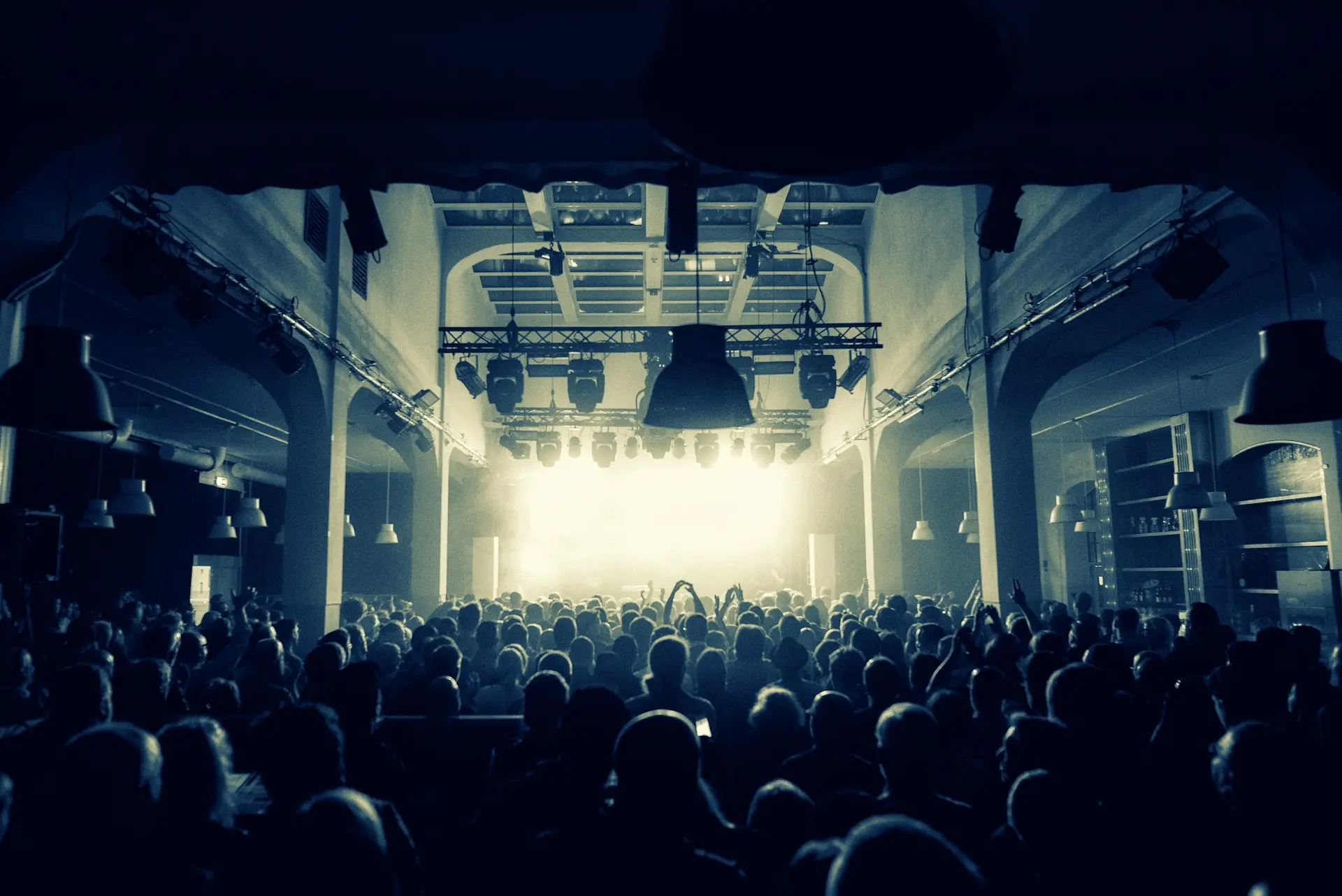 people sitting on chairs inside building
